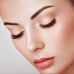 Beautiful Woman with Extreme Long False Eyelashes. Eyelash Extensions. Makeup, Cosmetics. Beauty, Skincare